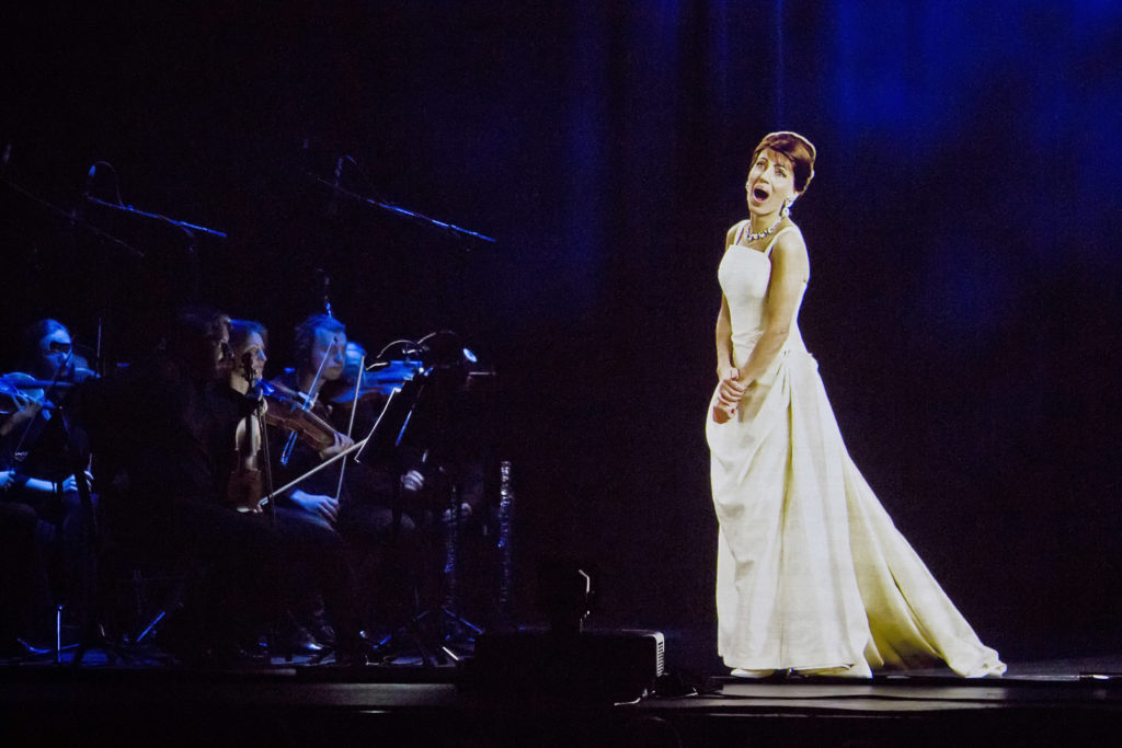 A hologram of dead opera star Maria Callas "singing" onstage during a concert at Berlin's Admiralspalast in 2019. (Photo by Frank Hoensch/Redferns)