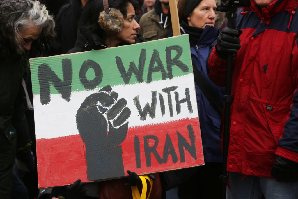 Protesters rally against the American aggression towards Iran following the US airstrike that killed Iranian Major-General Qassem Soleimani. Photo by Creative Touch Imaging Ltd./NurPhoto via Getty Images.