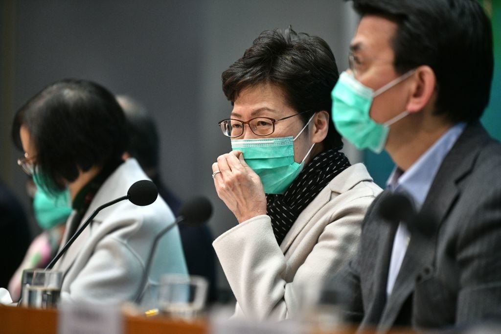 Hong Kong's Chief Executive, Carrie Lam, wearing a facemask while updating press on the state's response to the coronavirus, which has infected eight people in the city. Photo: Anthony Wallace/AFP via Getty Images.