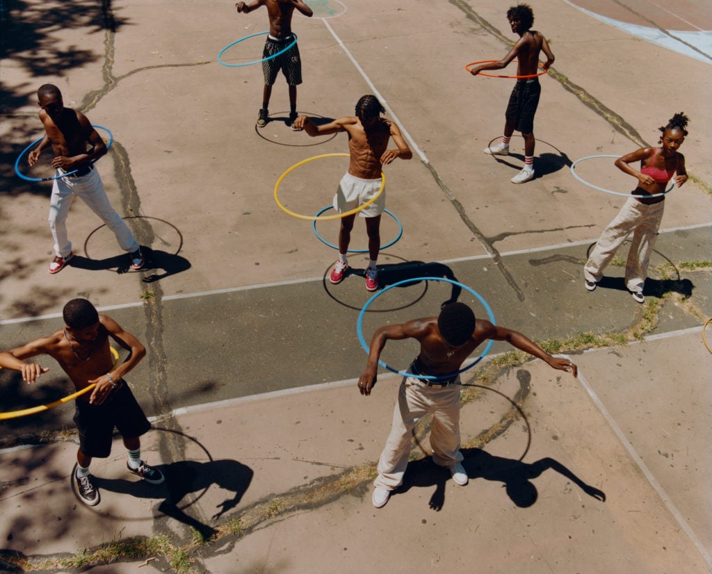 Tyler Mitchell, Untitled (Group Hula Hoop) (2019). © Tyler Mitchell. Courtesy of the International Center of Photography.