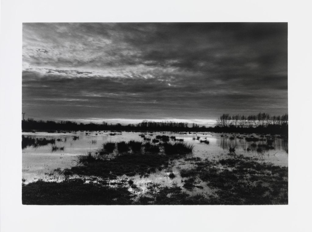 Don McCullin, The Somerset levels at dusk (1998). ©Don McCullin. Courtesy of the artist and Hauser & Wirth.