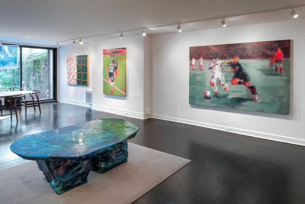 Installation view of "Arena" at East Projects. Left to Right: Henry Swanson, Kristofer Kimmel. Fiberglass and resin sculpture by Jillian Mayer. Image courtesy of the artists, and East Projects, New York