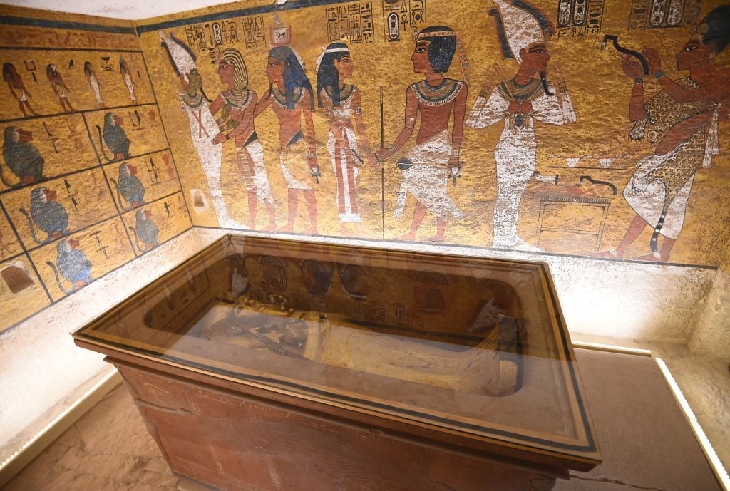 This picture taken on January 31, 2019 shows the golden sarcophagus of the 18th dynasty Pharaoh Tutankhamun, displayed in his burial chamber in his underground tomb (KV62) in the Valley of the Kings. Photo: Mohamed El-Shahed / AFP via Getty Images.
