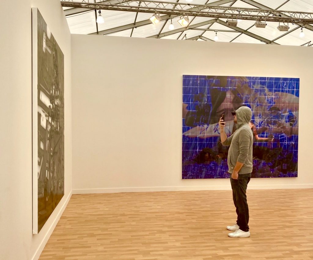 Leo contemplating mid-flip. The guy sells almost as much art as Hauser & Wirth, where he was seen “admiring” these Avery Singer works. Photo courtesy of Kenny Schachter.