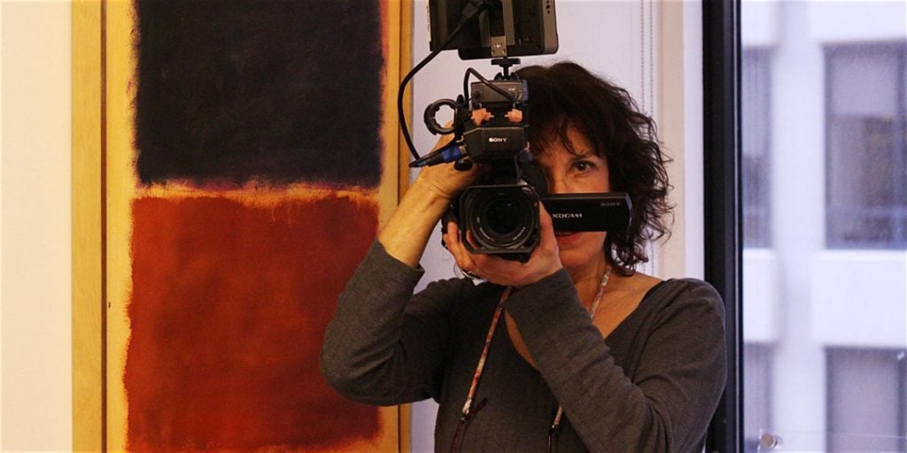 Daria Price, director of <em>Driven to Abstraction</em> with the fake Rothko at the heart of the Knoedler forgery scandal. Photo courtesy of Daria Price.