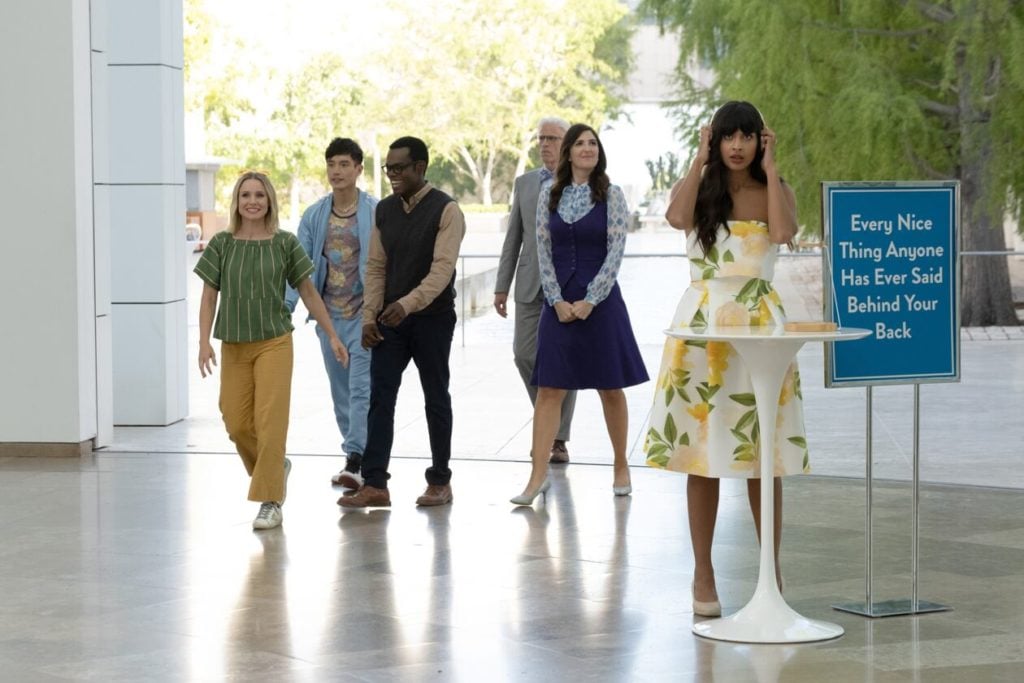 Kristen Bell as Eleanor, Manny Jacinto as Jason, William Jackson Harper as Chidi, D'Arcy Carden as Janet, Ted Danson as Michael, and Jameela Jamil as Tahani, on the grounds of the Getty Center in episode "Patty" on <em>The Good Place</em>. Photo by Colleen Hayes/NBC.