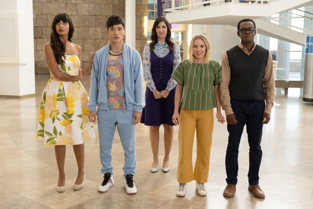 Jameela Jamil as Tahani; Manny Jacinto as Jason; D'Arcy Carden as Janet; Kristen Bell as Eleanor; and William Jackson Harper as Chidi, on the grounds of the Getty Center in the finale episode of The Good Place. Photo by Colleen Hayes/NBC.
