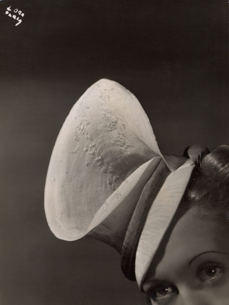 Madame d'Ora, <i>Woman modeling a hat by Mme Agnes</i> (ca. 1938). Courtesy Photoinstitut Bonartes Vienna. 