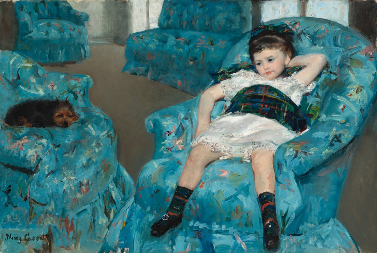 A painting by Mary Cassatt. A little girl with brown hair sits on a blue armchair. Opposite, a small dog sits curled up on a similar chair.