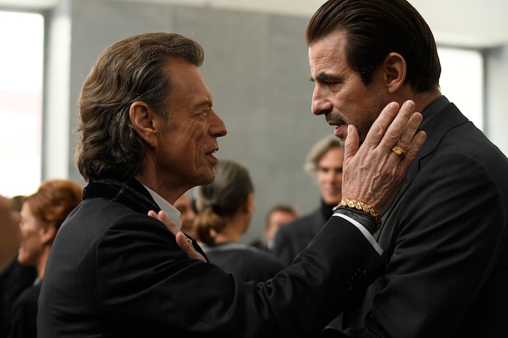 Left to Right: Mick Jagger as Joseph Cassidy, Claes Bang as James Figueras Photo by Jose Haro. Courtesy Sony Pictures Classics