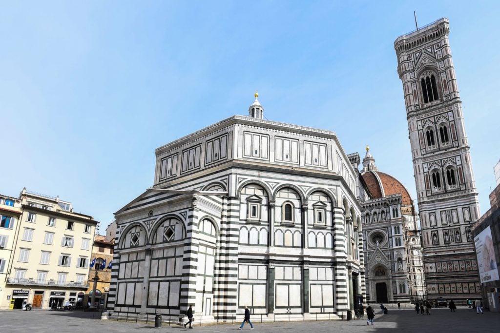 A general view taken on March 10, 2020 shows the deserted Piazza del Duomo in Florence, Tuscany, with the Battistero di San Giovanni (C) and the Santa Maria del Fiore cathedral (Rear) as Italy imposed unprecedented national restrictions in response to the public-health crisis. (Photo by CARLO BRESSAN/AFP via Getty Images)