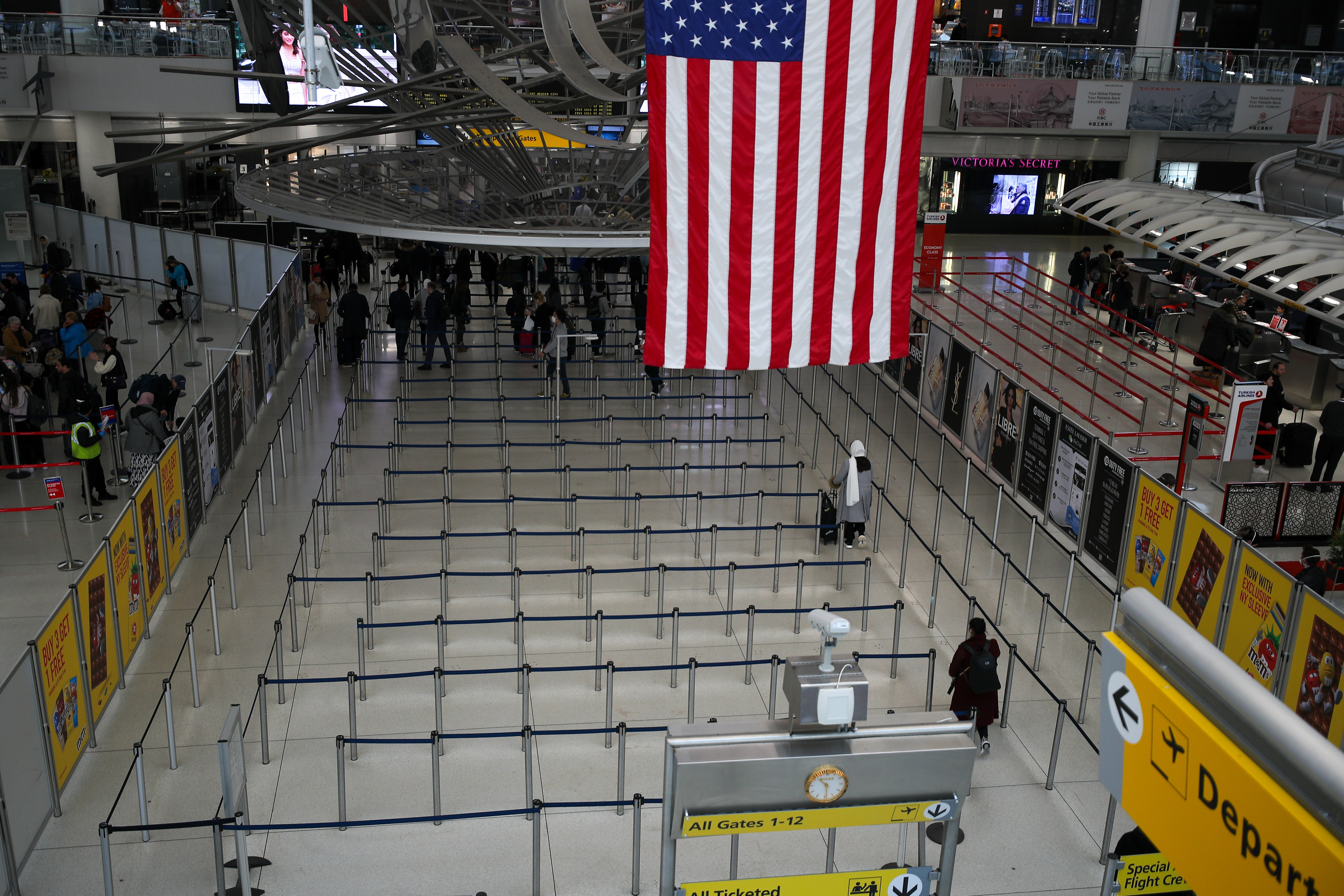 Some of European airline counters at JFK Airport seen empty in New York. Photo by Tayfun Coskun/Anadolu Agency via Getty Images.