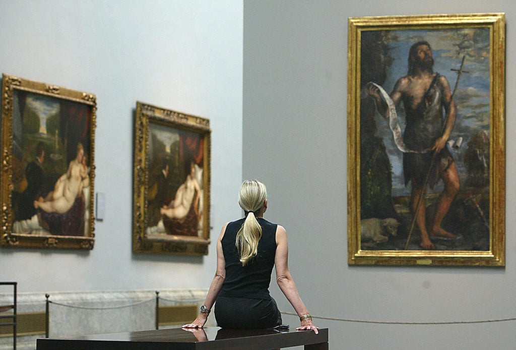 Paintings by Tiziano at the Prado in 2003. (CHRISTOPHE SIMON/AFP via Getty Images)