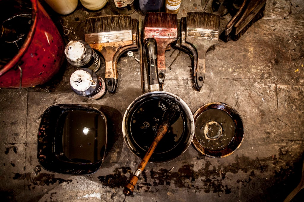 Supplies in an artist's studio. Photo by Stephane Grangier/Corbis/Getty Images.