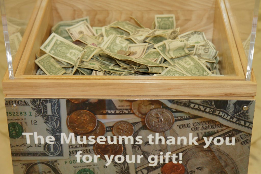 Donation box inside the National Portrait Gallery. (Photo by: Jeffrey Greenberg/Universal Images Group via Getty Images)