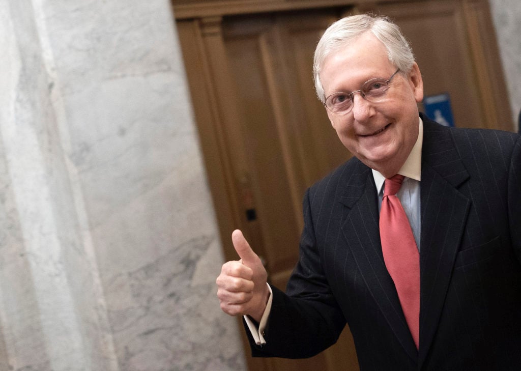 Senate Majority Leader Mitch McConnell gives a thumbs up sign as he arrives at the Capitol on March 25, 2020 in Washington, DC. Photo by Win McNamee/Getty Images.
