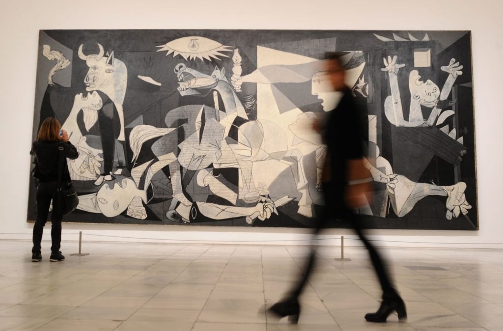Photo by Guernica in the Museo Reina Sofia, Madrid. Denis Doyle, Getty Images. 