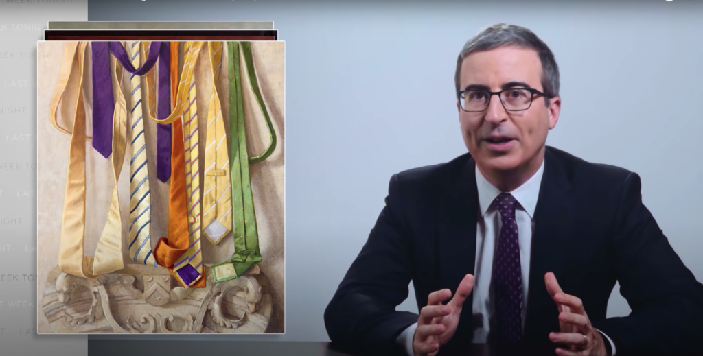 John Oliver with a painting by Judy Kudlow.
