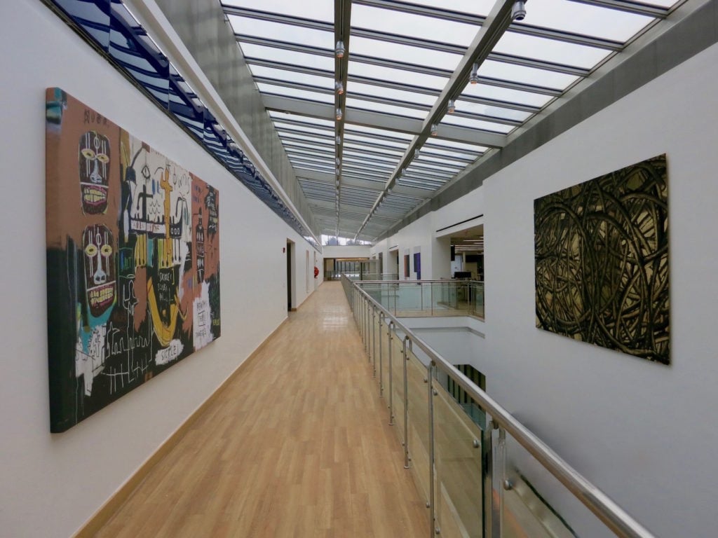 Basquiat's Blue Nile in the hallways of Axe Capital.
