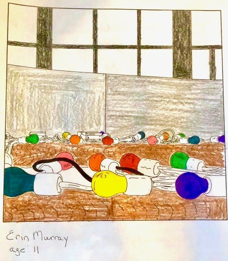 Erin, 11, does a page from MoMA Louise Lawler coloring book.