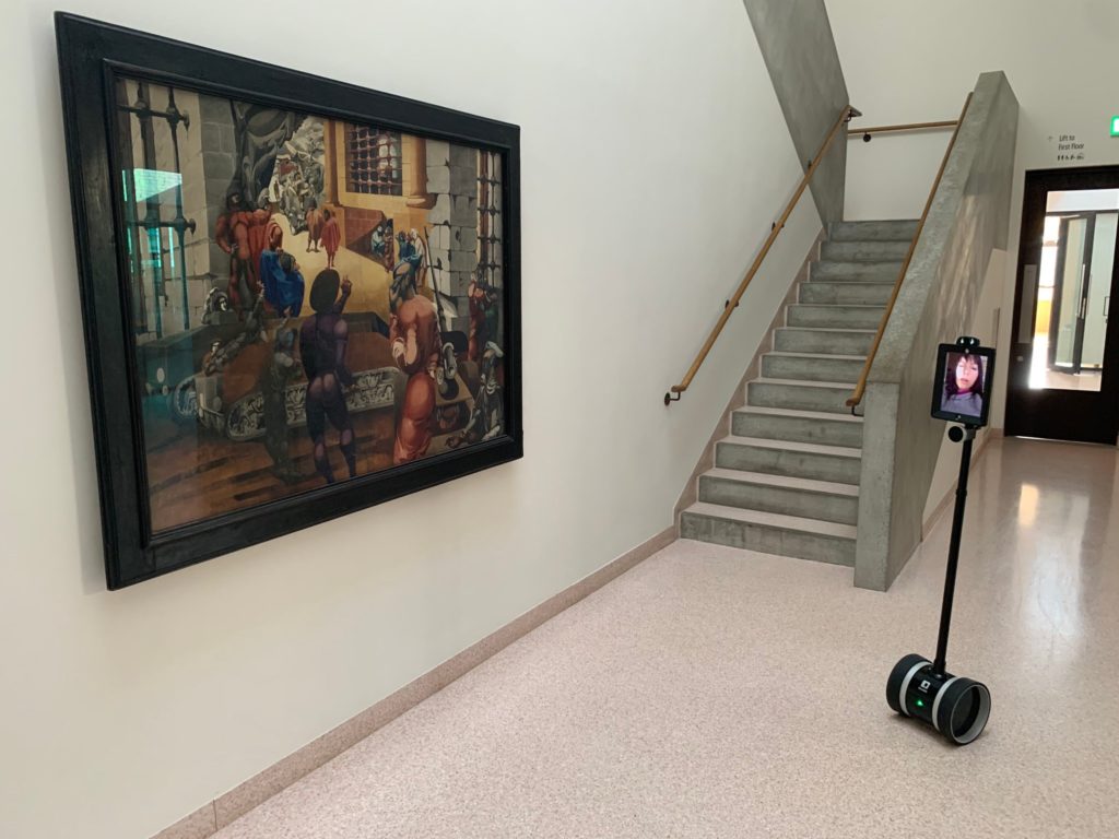 The Double Robotics telepresence robot views Edward Burra’s </em>War in the Sun.</em> at the Hastings Contemporary. Photo by Will Barrett/Hastings Contemporary, courtesy of the Estate of Edward Burra/Lefevre Fine Art Ltd; via Daniel Katz Gallery. 
