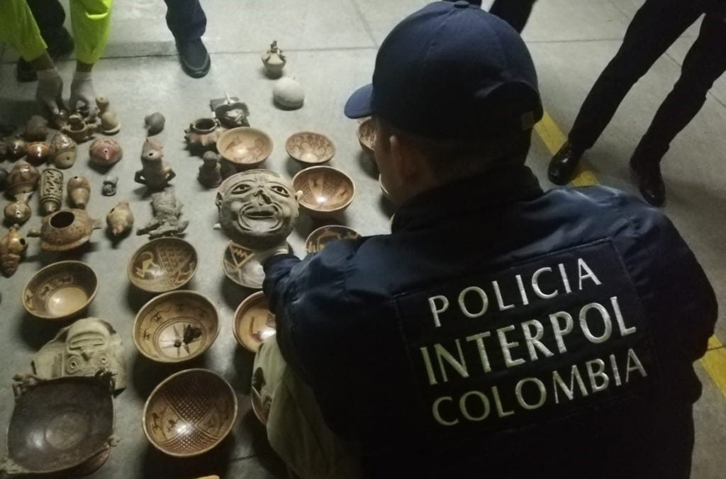 Columbian authorities with a trove of stolen artifacts in Bogota.