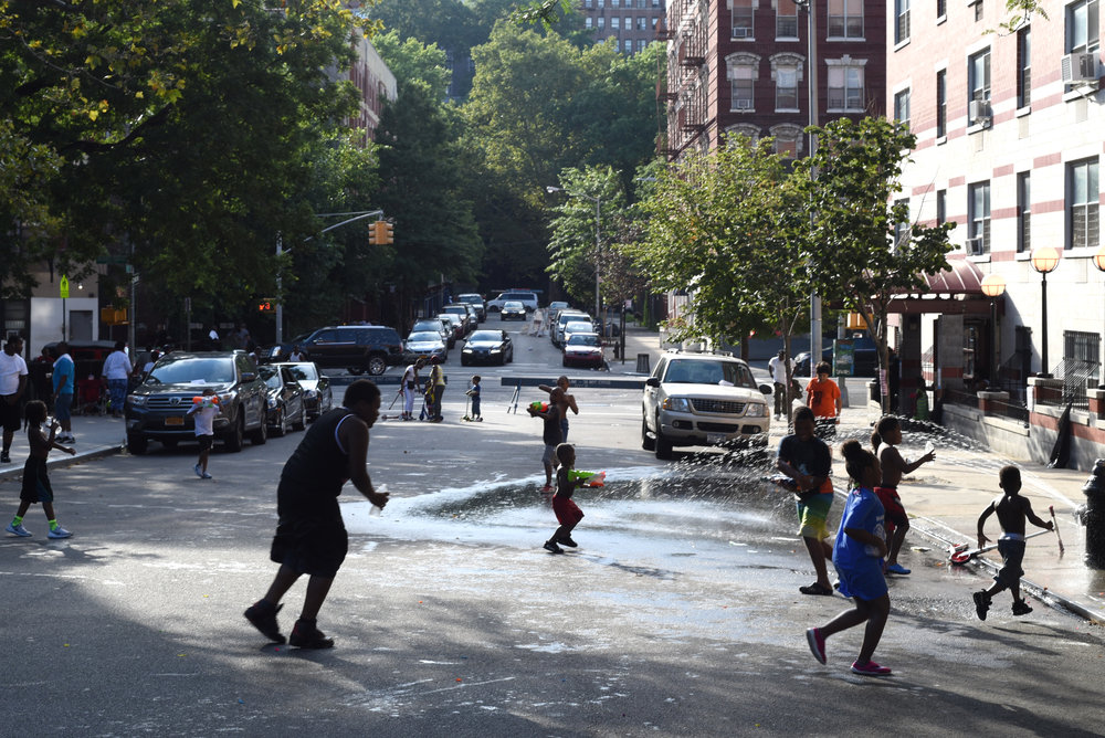 Fire hydrant block party. Harlem 148th St, end of the 3 train; 2016. From the series "End of the Line." Photo courtesy of Taylor Chapman. 