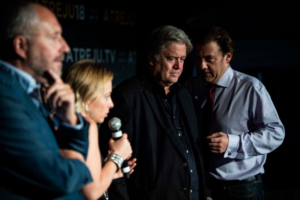 Benjamin Harnwell, right, translates as former White House Chief Strategist Steve Bannon participates in a press conference at Atreju 2018, a conference of right wing activists, on Saturday, Sept 22, 2018 in Rome, Italy. Photo: Jabin Botsford/The Washington Post via Getty Images.