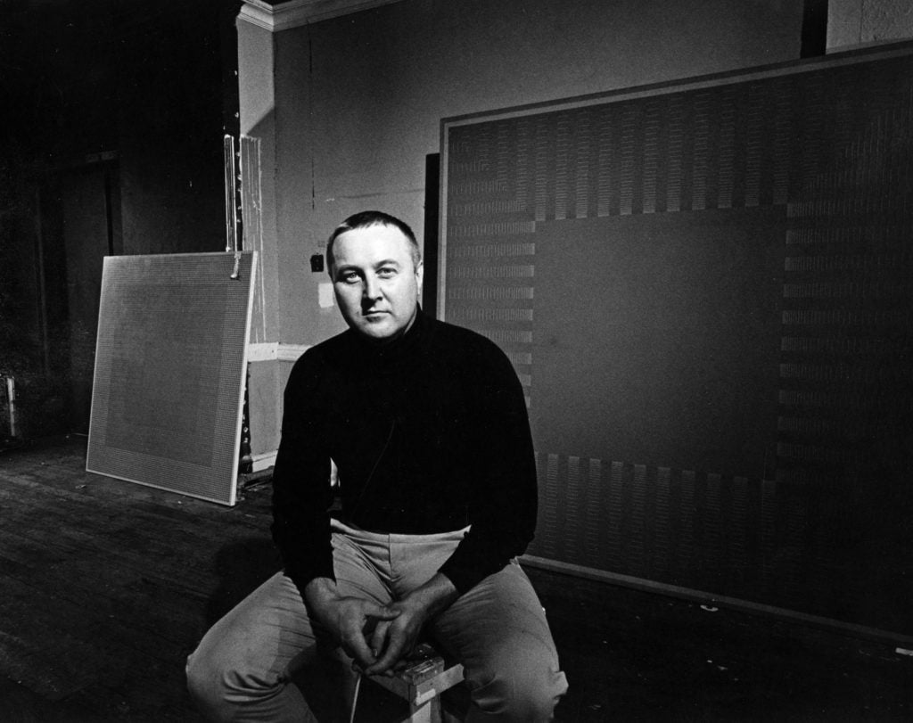 Artist Richard Anuszkiewicz photographed in his studio in 1968. Photo by Jack Mitchell/Getty Images.