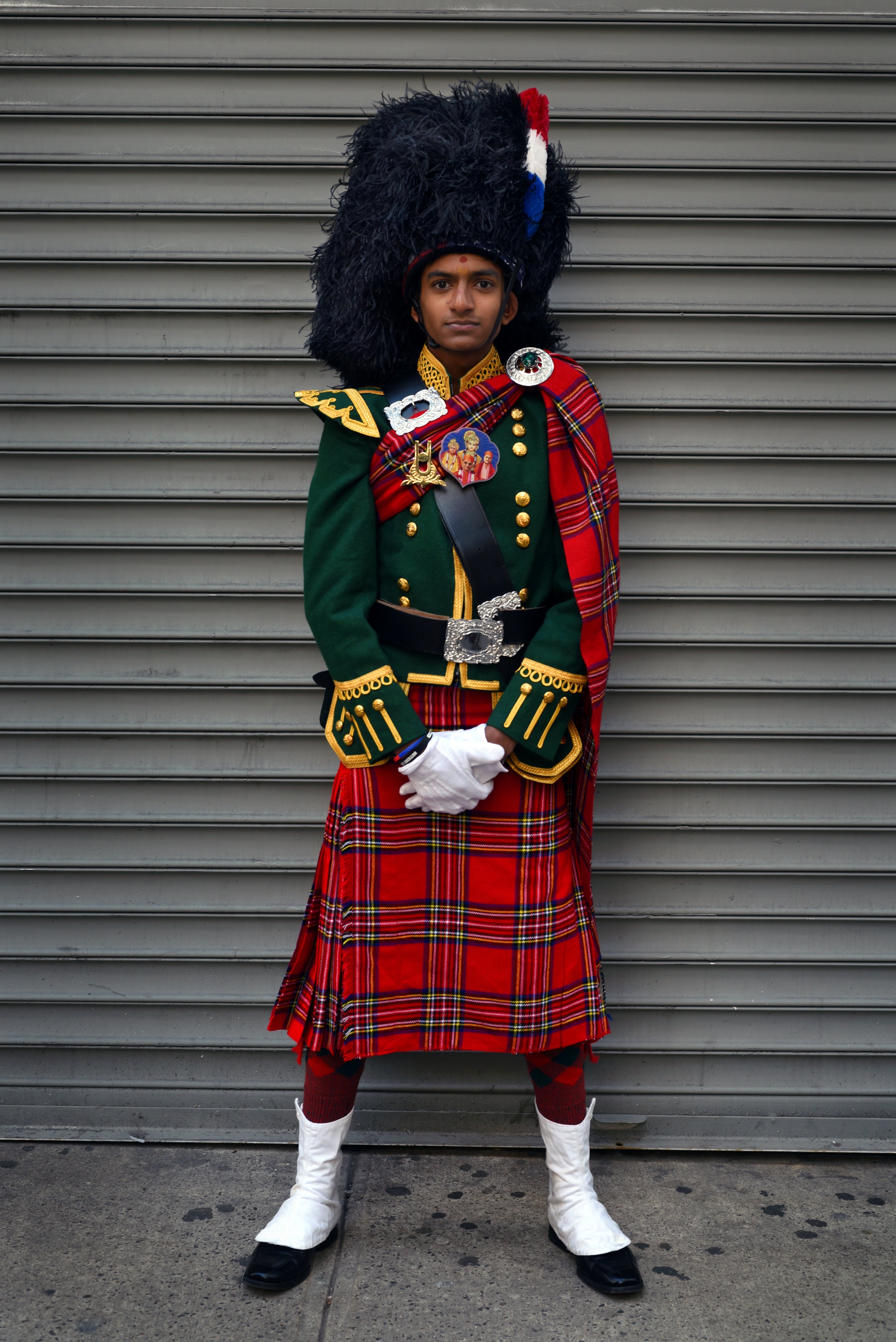 Harshil, a member of the Shree Muktajeeven Swamibapa pipe band. Its namesake, a religious leader of the Swaminarayan branch of Hinduism, saw a Scottish pipe band perform in Trafalgar Square and asked his followers to establish a similar band in 1972. Its original nine members were trained by an intense Scottish bandmaster named Major Caution. The band has five divisions around the world, including in the UK and Nairobi. Grand Central, end of the S train. Grand Central, end of the Manhattan S train; 2017. From the series "End of the Line." Photo courtesy of Taylor Chapman.