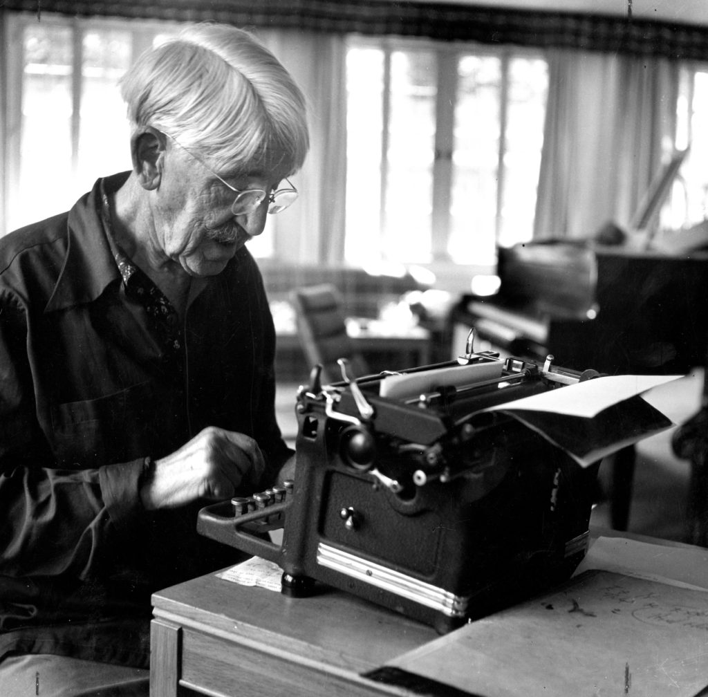 American philosopher, psychologist, and educational reformer John Dewey sitting at a typewriter, 1946. Photo by JHU Sheridan Libraries/Gado/Getty Images.