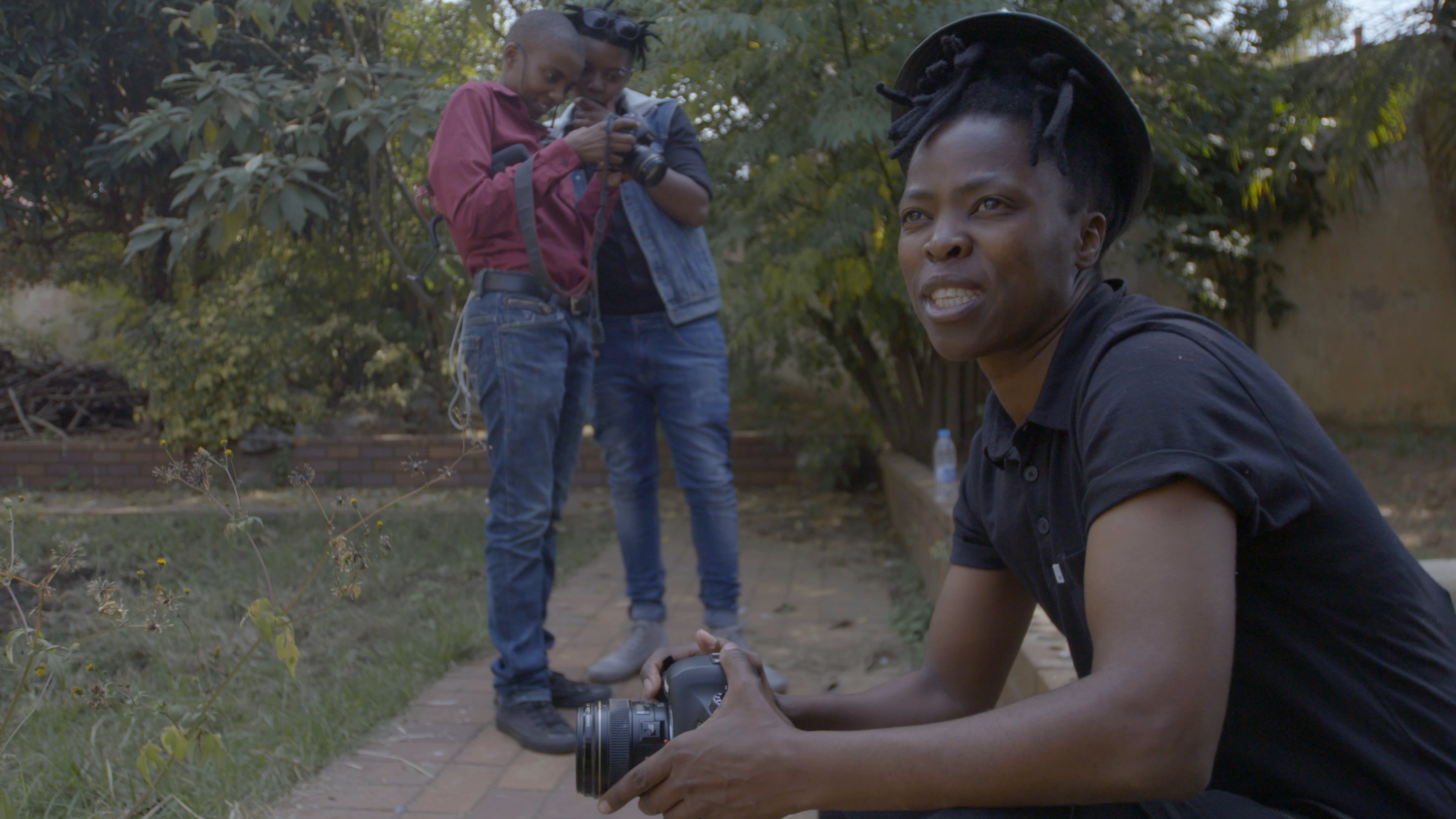 Zanele Muholi at work in a production still from the Art21 "Extended Play" film, "Zanele Muholi: Mobile Studios." © Art21, Inc. 2019.