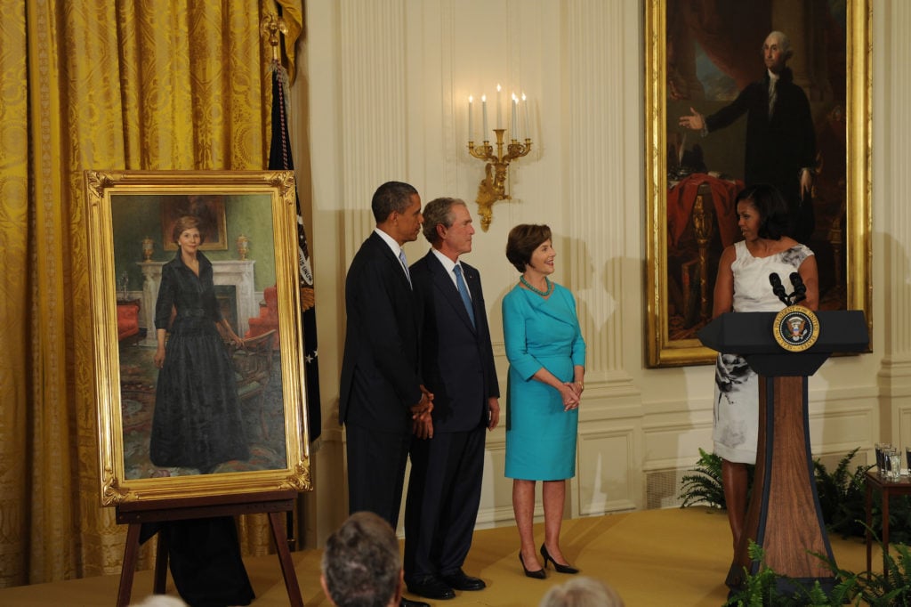 President Barack Obama welcomes former President George W. Bush and Former First Lady Laura Bush back to the White House to unveil his formal Presidential portrait that will hang form this point on in the White House. Photo by ImageCatcher News Service/Corbis via Getty Images.