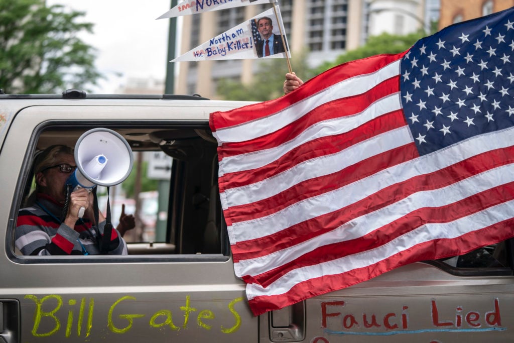 Protesters rally from their cars as they call for the state to lift stay-at-home orders and reopen the economy in downtown Richmond, Virginia near the State Capitol complex on May 6, 2020. Photo by Drew Angerer/Getty Images.