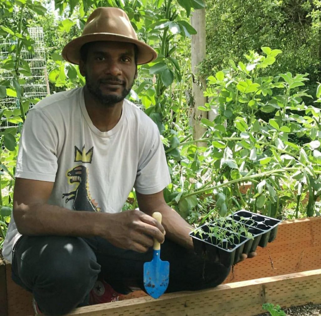 John Wesley is working with Seattle area farms on his new project, Seattle BIPOC Organic Food Bank. Photo by Lizzy Miran/Danny Woo Community Garden, courtesy of John Wesley.