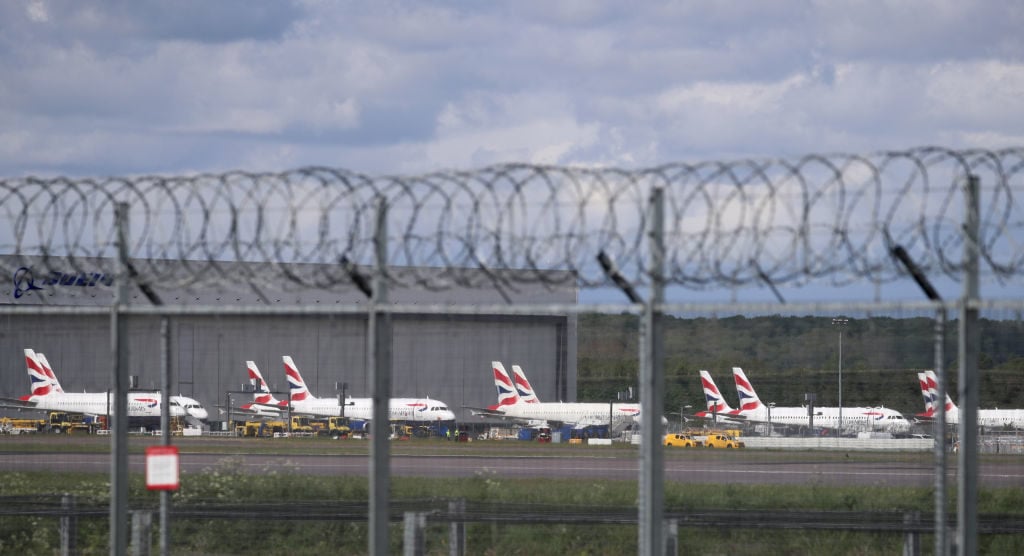 British Airways planes parked at Gatwick Airport. Photo by Gareth Fuller/PA Images via Getty Images.