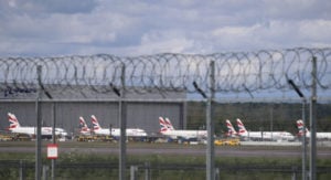 British Airways planes parked at Gatwick Airport as the UK continues in lockdown to help curb the spread of the coronavirus. Photo by Gareth Fuller/PA Images via Getty Images.