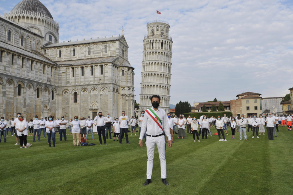 Mayor of Pisa Michele Conti joined in the flash mob near the tower of Pisa on May 30, 2020 in Pisa, Italy. (Photo by Laura Lezza/Getty Images)
