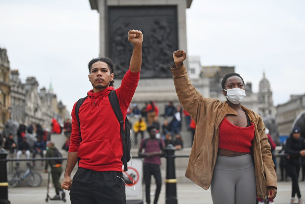 Protesters in front of Nelson's Column in London's Trafalgar Square during a Black Lives Matter rally. Photo by Victoria Jones/PA Images via Getty Images.