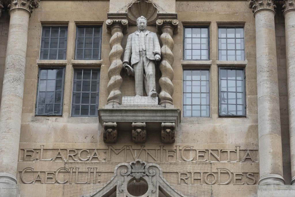 The statue of imperialist Cecil Rhodes at Oxford College. Photo by Stringer/Anadolu Agency via Getty Images.