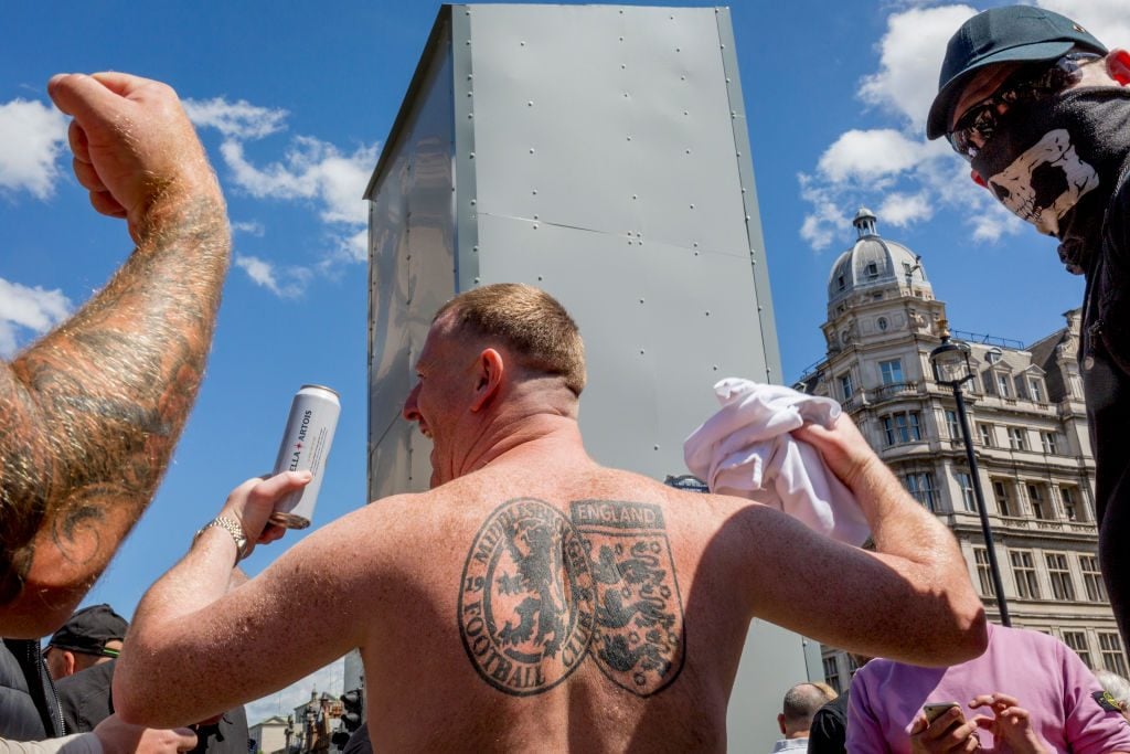 A large group crowd of right-wing groups and veterans gathered at the boxed-in statue of Winston Churchill to 'protect it from further vandalism' by Black Lives Matter and anti-racism protesters. Photo by Richard Baker / In Pictures via Getty Images.
