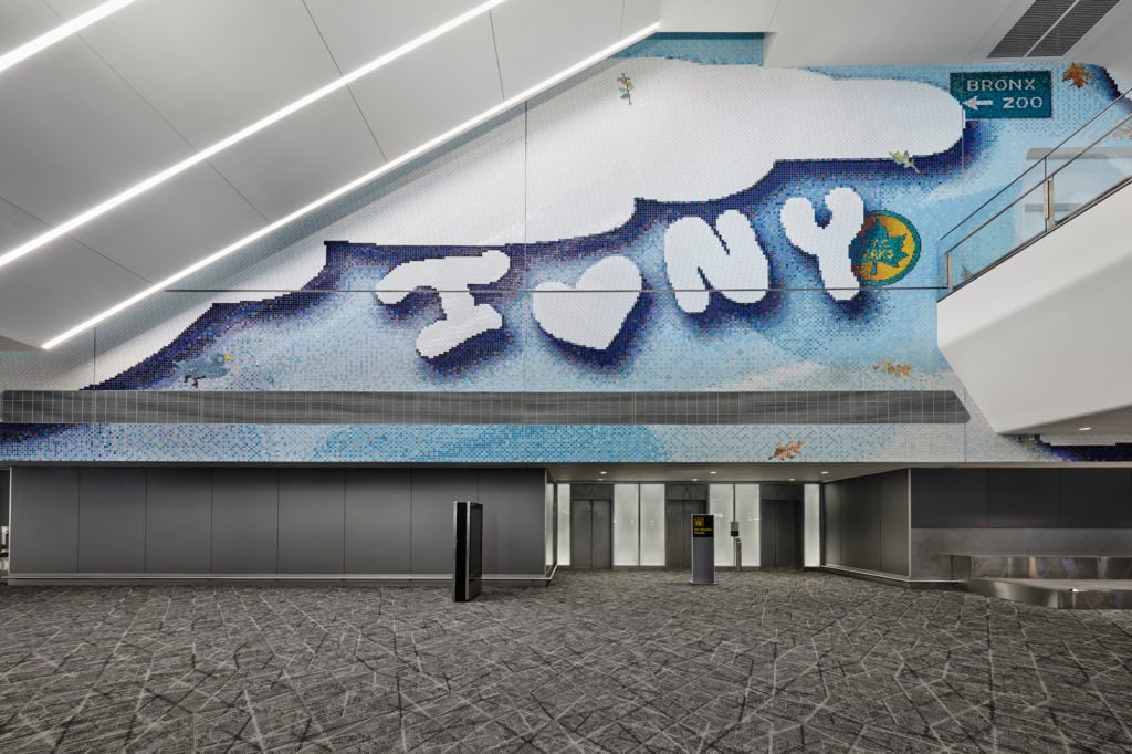 Laura Owens, I [pizza emoji] NY (2020). Commissioned by LaGuardia Gateway Partners in partnership with Public Art Fund for LaGuardia Airport’s Terminal B. Photo by Tom Powel Imaging, courtesy of the artist; Gavin Brown’s Enterprise, New York, Rome; Sadie Coles HQ, London; and Galerie Gisela Capitan, Cologne.