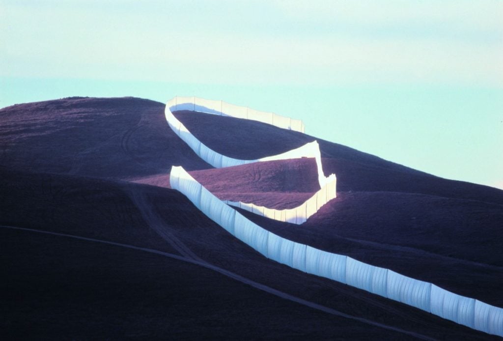 Christo and Jeanne-Claude, Running Fence, Sonoma and Marin Counties, California, (1972–76). Photo by Wolfgang Volz ©1976 Christo.