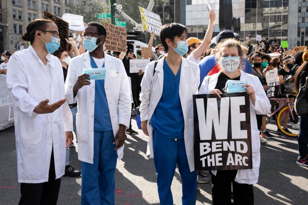 Medical workers gather in Foley Square. Image courtesy Ventiko.