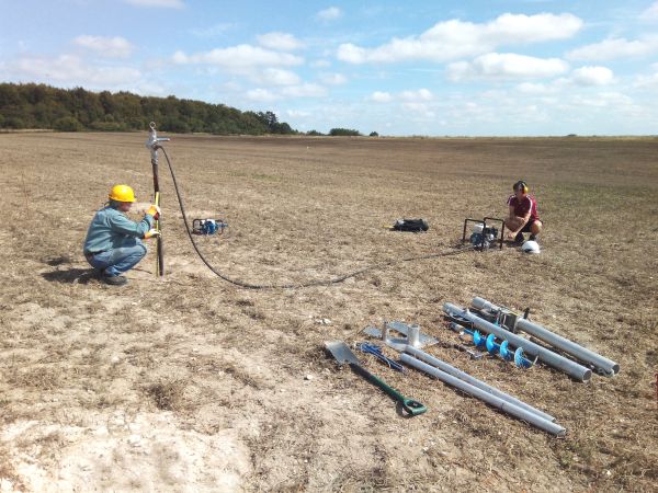The Stonehenge Hidden Landscape team taking a Vibracore sample from one of the pits. Photo courtesy of Stonehenge Hidden Landscapes. 