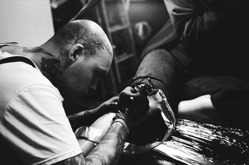 Joey Rosado tattooing. Photo courtesy of the artist.