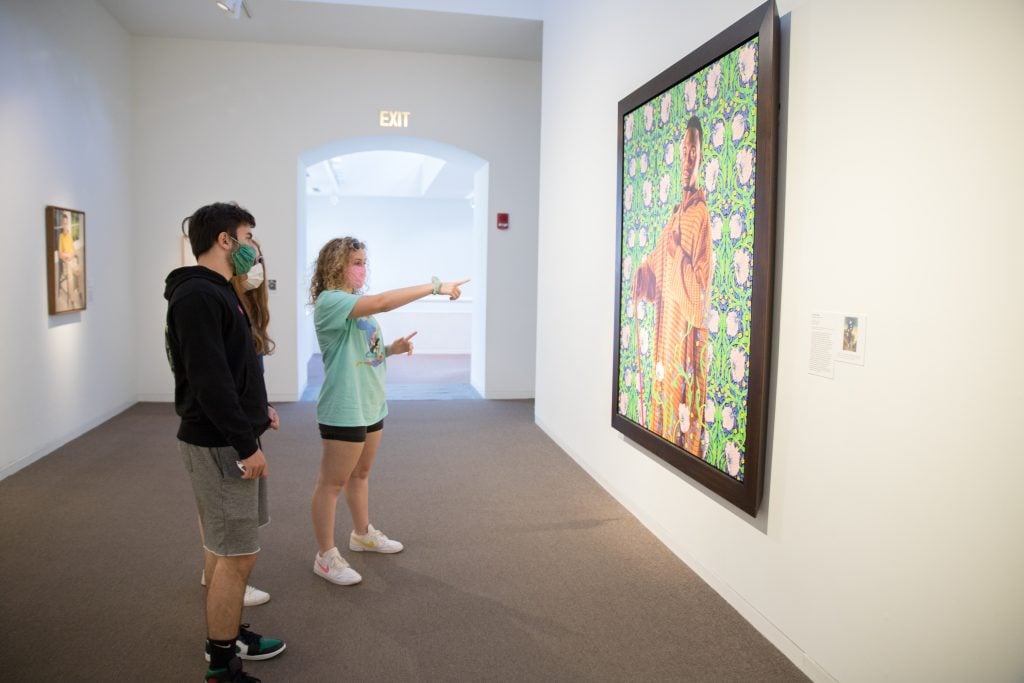 Visitors in face masks appreciate a Kehinde Wiley at the San Antonio Museum of Art. Photo courtesy of the San Antonio Museum of Art.