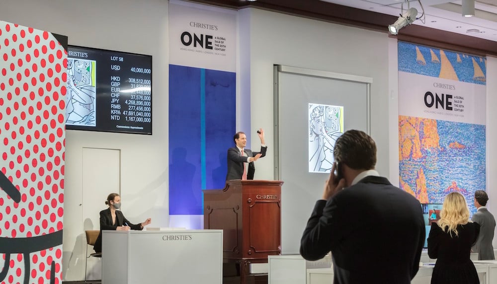 Auctioneer Adrien Meyer at Christie's Rockefeller Center saleroom during the New York portion of the ONE sale on July 10. Image courtesy Christie's
