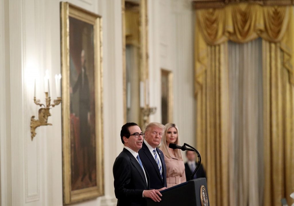 U.S. President Donald Trump and his daughter Ivanka listen as U.S .Treasury Secretary Steven Mnuchin speaks during an event on supporting small businesses through the Paycheck Protection Program in April. (Photo by Win McNamee/Getty Images)