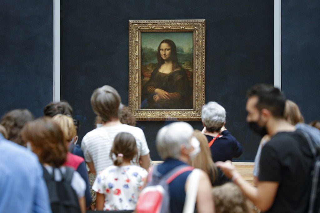 People visit the Louvre Museum on the museum's reopening day after months of closure due to lockdown measures to combat the COVID-19 pandemic, in Paris, France on July 06, 2020. Photo by GEOFFROY VAN DER HASSELT/Anadolu Agency via Getty Images.